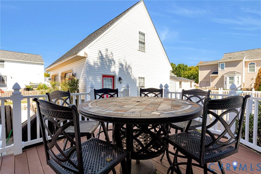Expansive outdoor deck with composite decking and white railings