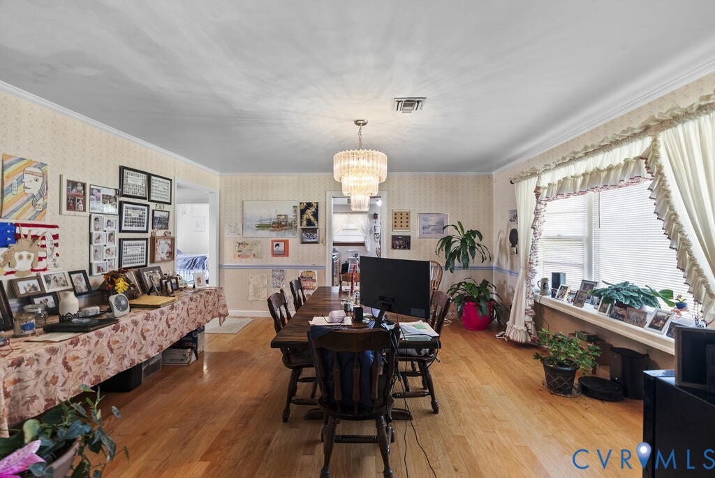 21 Vanderpool Lane, Detached, Cumberland, VA 23040 Hardwood flooring, decorative chandelier, crown molding, and a large window with window treatments
