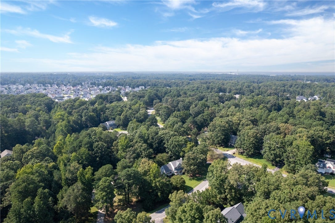 13802 Rockhaven Drive, Thornhill, Chester, VA 23836 Expansive wooded setting featuring mature trees, residential properties, and paved roadways