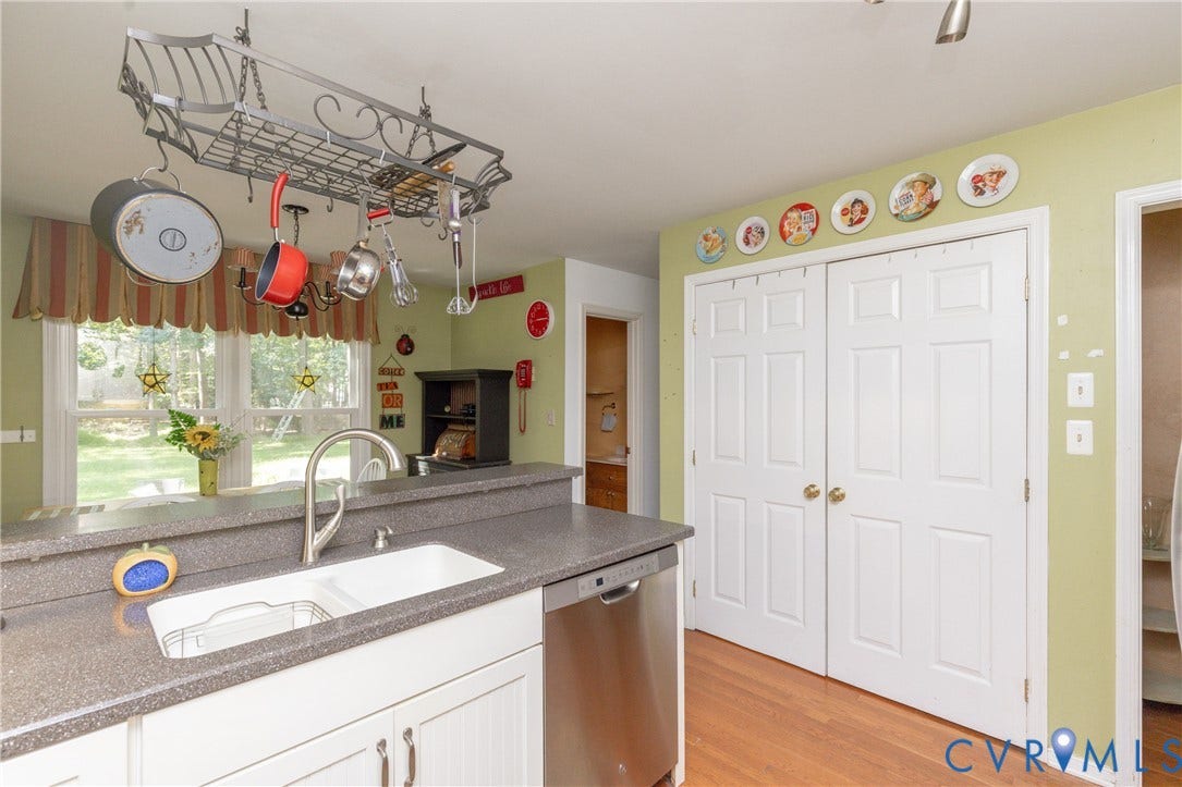 13802 Rockhaven Drive, Thornhill, Chester, VA 23836 Kitchen featuring a dual-basin sink, stainless steel dishwasher, and a pot rack