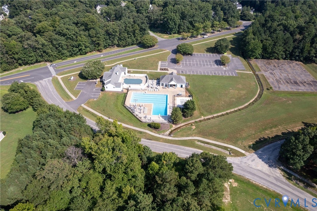 13802 Rockhaven Drive, Thornhill, Chester, VA 23836 Community center with two outdoor swimming pools, adjacent paved parking, and a nearby open field