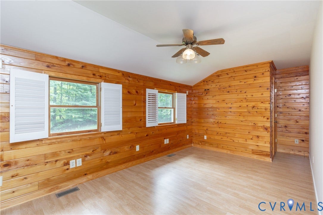 6464 Anderson Highway, Powhatan, VA 23139 Large Bedroom with ceiling fan and shutters