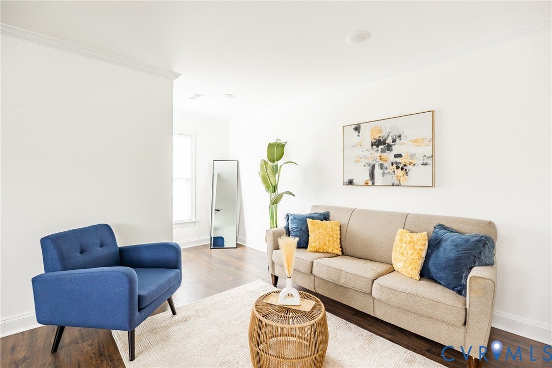 Recessed ceiling lighting, crown molding, and wood-finish flooring