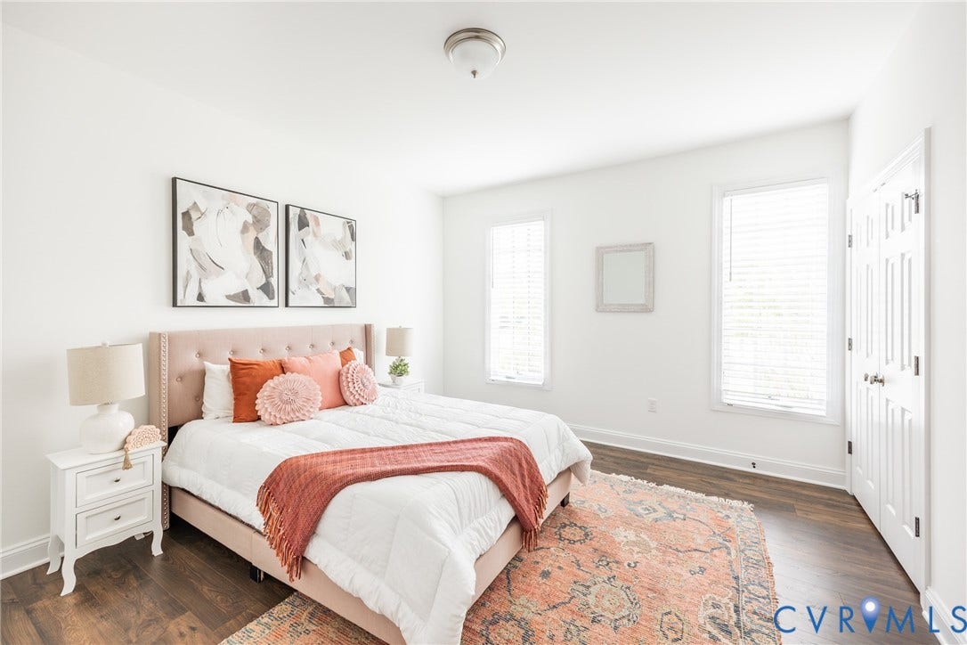 Alternate view of first floor bedroom with double door closet that utilizes all of the usable wall space for storage. Be sure to peek in the closet and to the right when you visit! It's much larger than it seems!