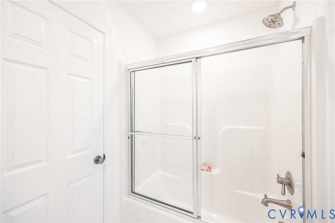 The Jack and Jill bathroom has separate area for the shower/tub combo.
