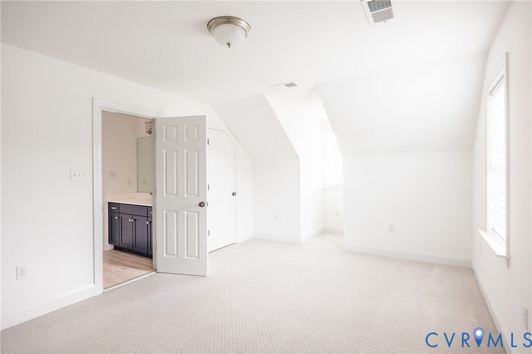 Alternate view of bedroom seven with attached full bathroom.
