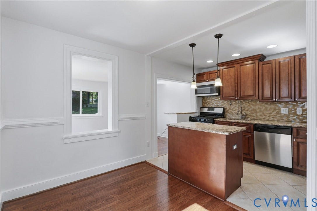 5108 Forest Hill Avenue, Westover Hills Area, Richmond, VA 23225 Kitchen featuring wood-finish cabinetry, granite countertops, stainless steel appliances, and a mosaic tile backsplash