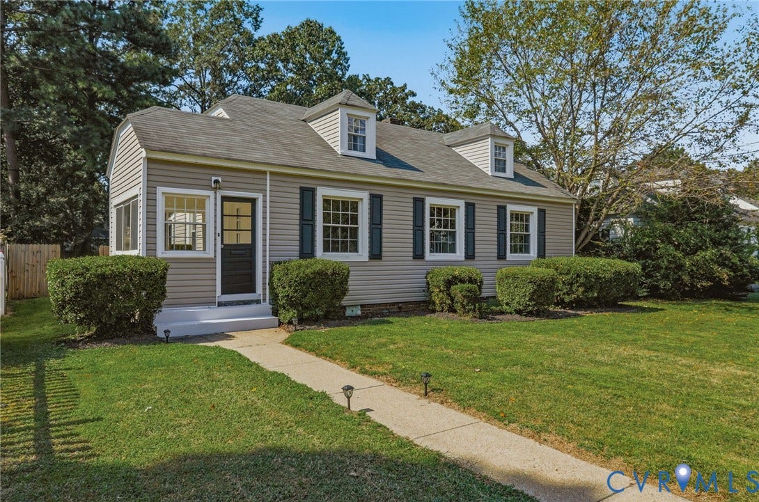 5108 Forest Hill Avenue, Westover Hills Area, Richmond, VA 23225 Siding exterior with dormer windows and dark shutters, featuring a front walkway with integrated lighting