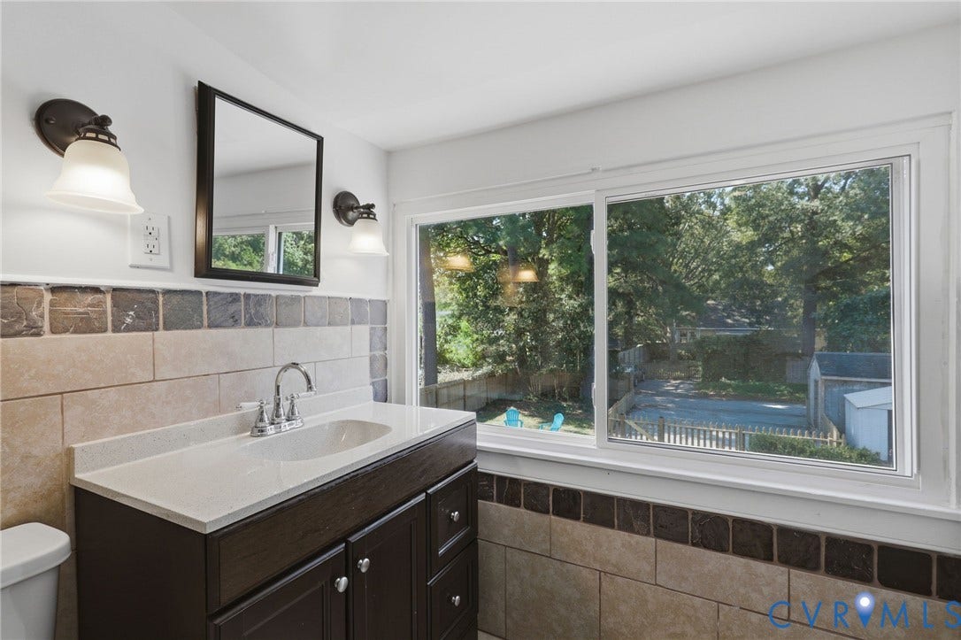 5108 Forest Hill Avenue, Westover Hills Area, Richmond, VA 23225 2nd floor full bath.Wood-finish vanity with a white countertop and undermount sink