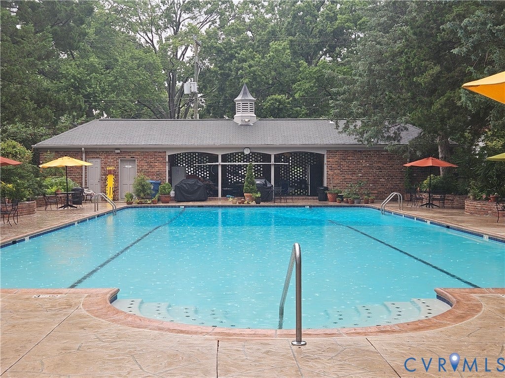 Resort style community pool and patio area