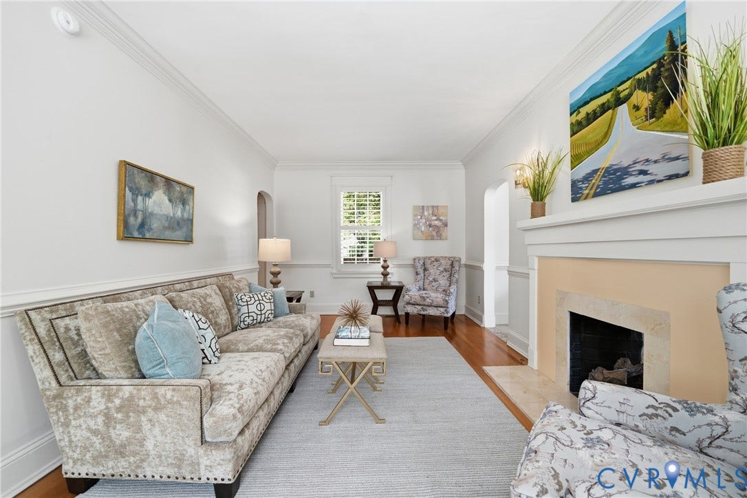 1500 Avondale Avenue, Bellevue, Richmond, VA 23227 Wood-finish flooring, crown molding, and a stone-surround fireplace with a painted mantel