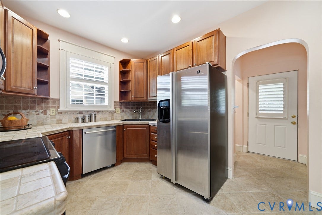 1500 Avondale Avenue, Bellevue, Richmond, VA 23227 Kitchen featuring wood cabinetry, stainless steel appliances, tile backsplash, tile flooring, and recessed lighting