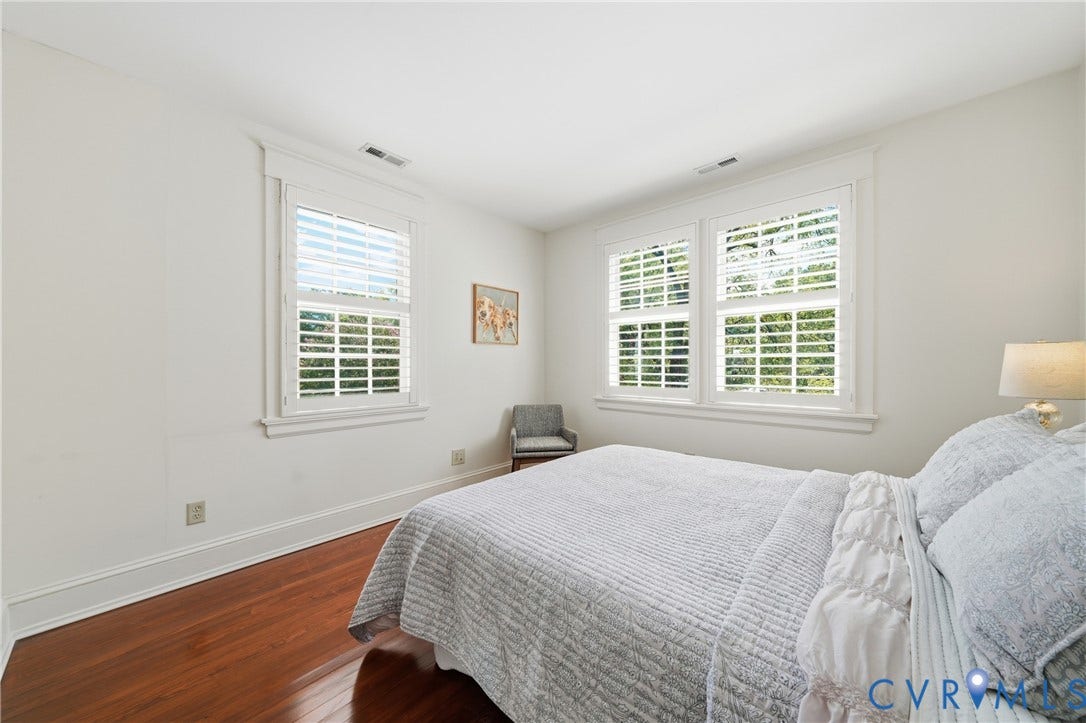 1500 Avondale Avenue, Bellevue, Richmond, VA 23227 Wood-finish flooring, white walls, and multiple windows with plantation shutters