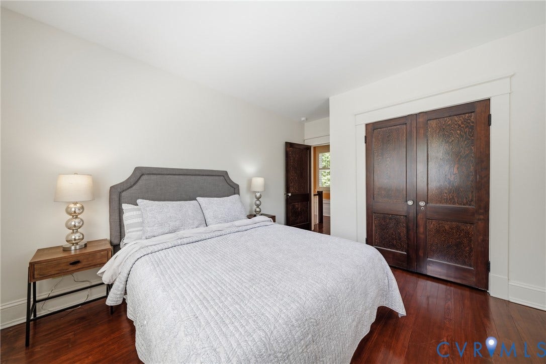 1500 Avondale Avenue, Bellevue, Richmond, VA 23227 Rich wood-finish flooring, dark wood-paneled doors, and white trim work