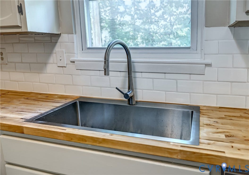 6100 Meadwood Circle, Hopkins Rd Corridor, Richmond, VA 23234 Large single basin, stainless sink! Love the urban chic feel of the stainless steel, butcher block combo!