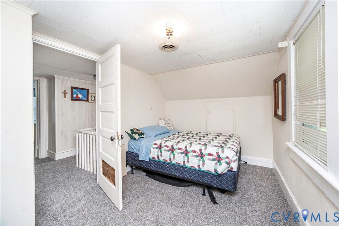 4912 Water View Road, Water View, Jamaica, VA 23180 New Carpete beroom with sloped ceilings, floor 2 a window with blinds, and a built-in access panel
