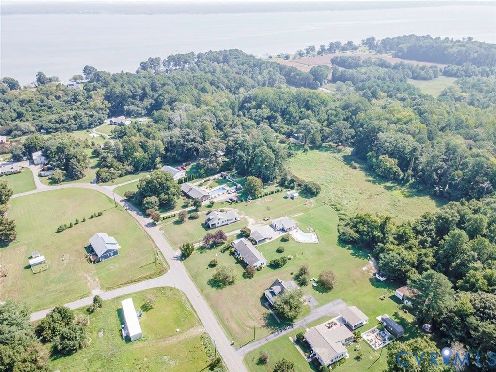 4912 Water View Road, Water View, Jamaica, VA 23180 Waterfront community setting with mature trees and paved roads