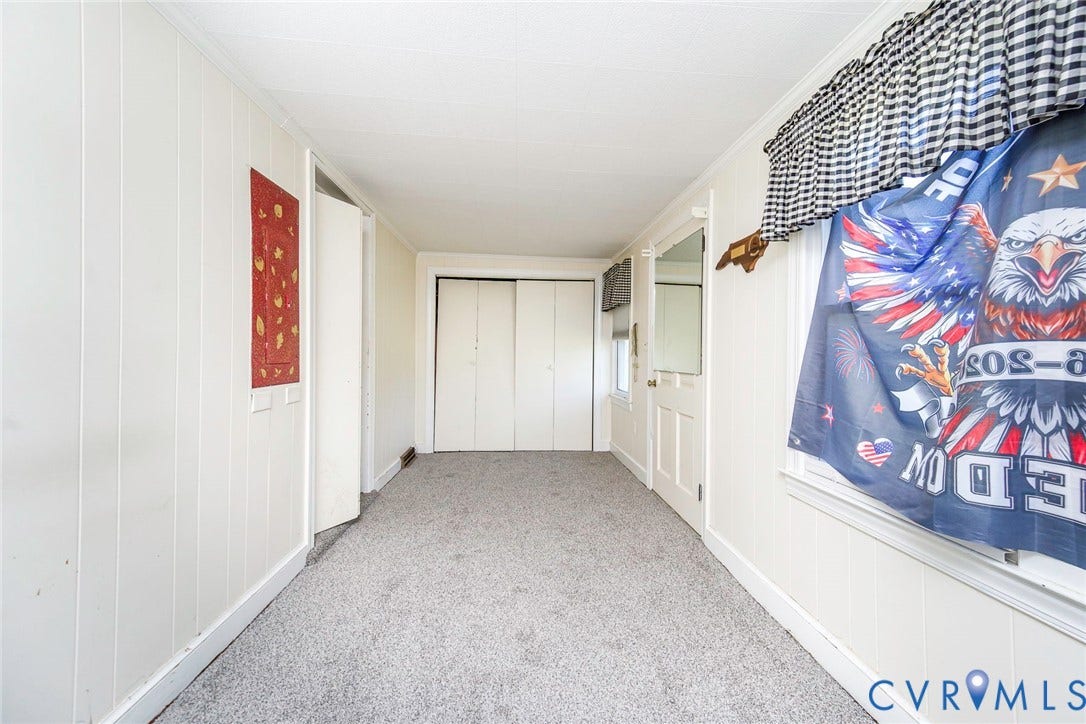 4912 Water View Road, Water View, Jamaica, VA 23180 White paneled walls and light gray carpeting