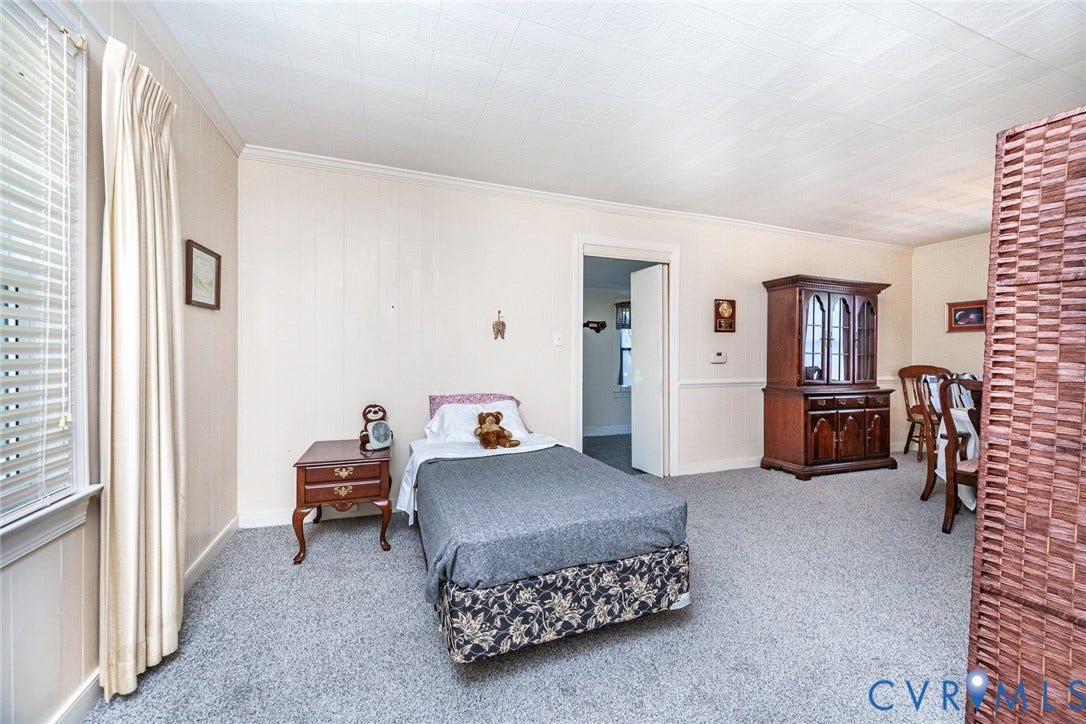 4912 Water View Road, Water View, Jamaica, VA 23180 Wall-to-wall carpeting with a neutral finish, featuring light-toned walls, and white trim