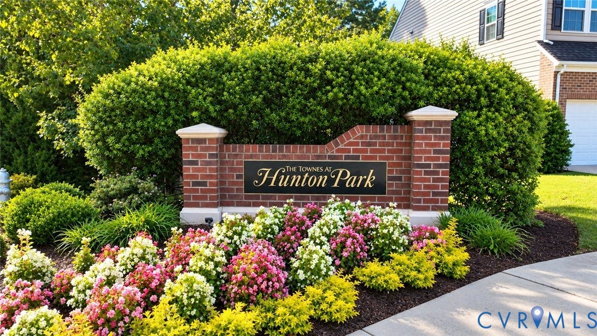 Brick monument signage featuring a decorative plaque
