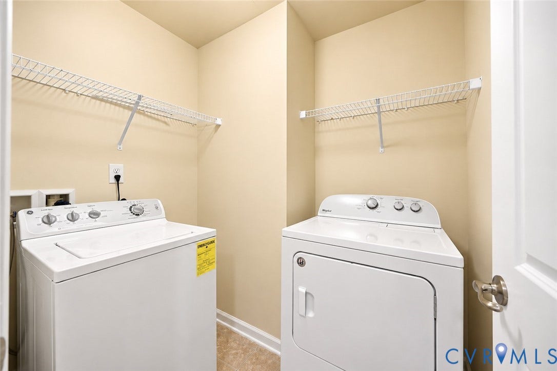 2nd floor -Dedicated laundry area with built-in wire shelving and durable flooring