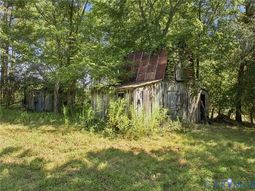 230 sq. ft. Storage Barn & 600 sq. ft. Cattle Shed