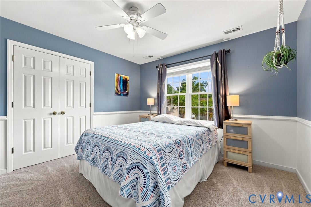 11342 McCauliff Court, North Chesterfield, VA 23236 Bedroom #3 w/ Panel doors, ceiling fan, carpet flooring, window with exterior views, and wainscoting