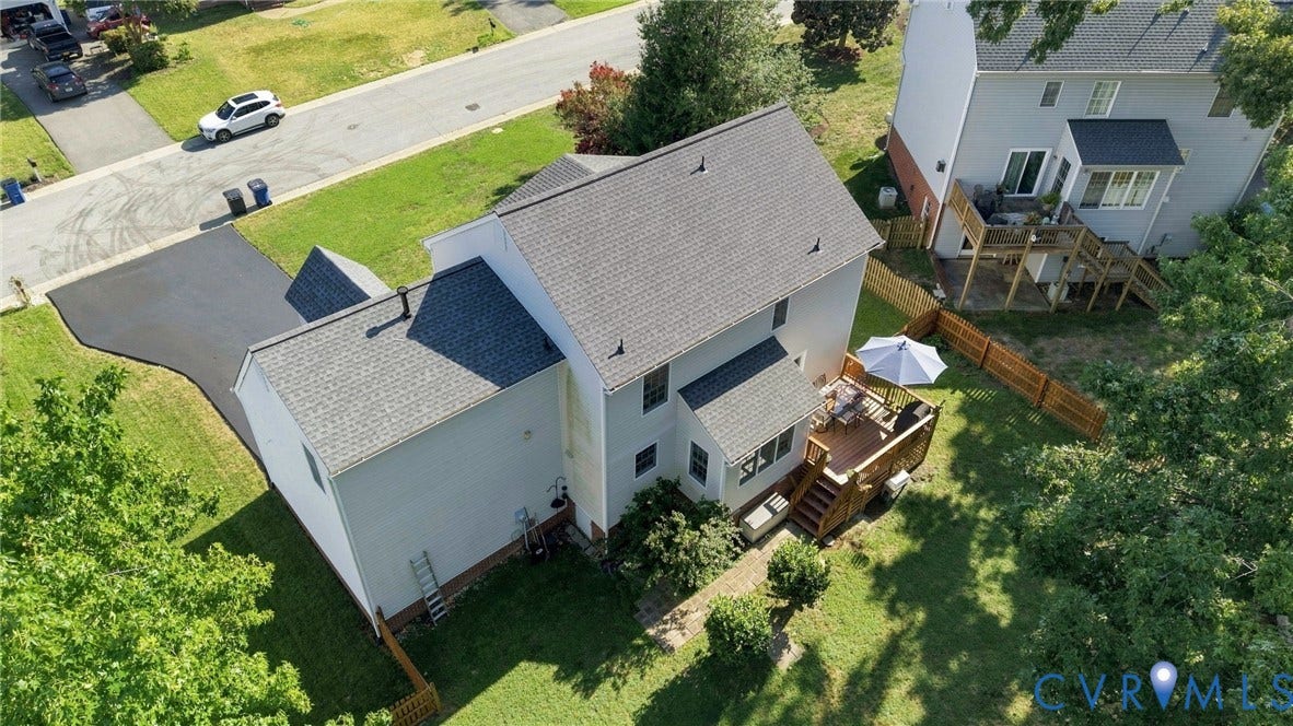 11342 McCauliff Court, North Chesterfield, VA 23236 Exterior featuring a multi-level deck, wood fencing, asphalt driveway, and a shingle roof