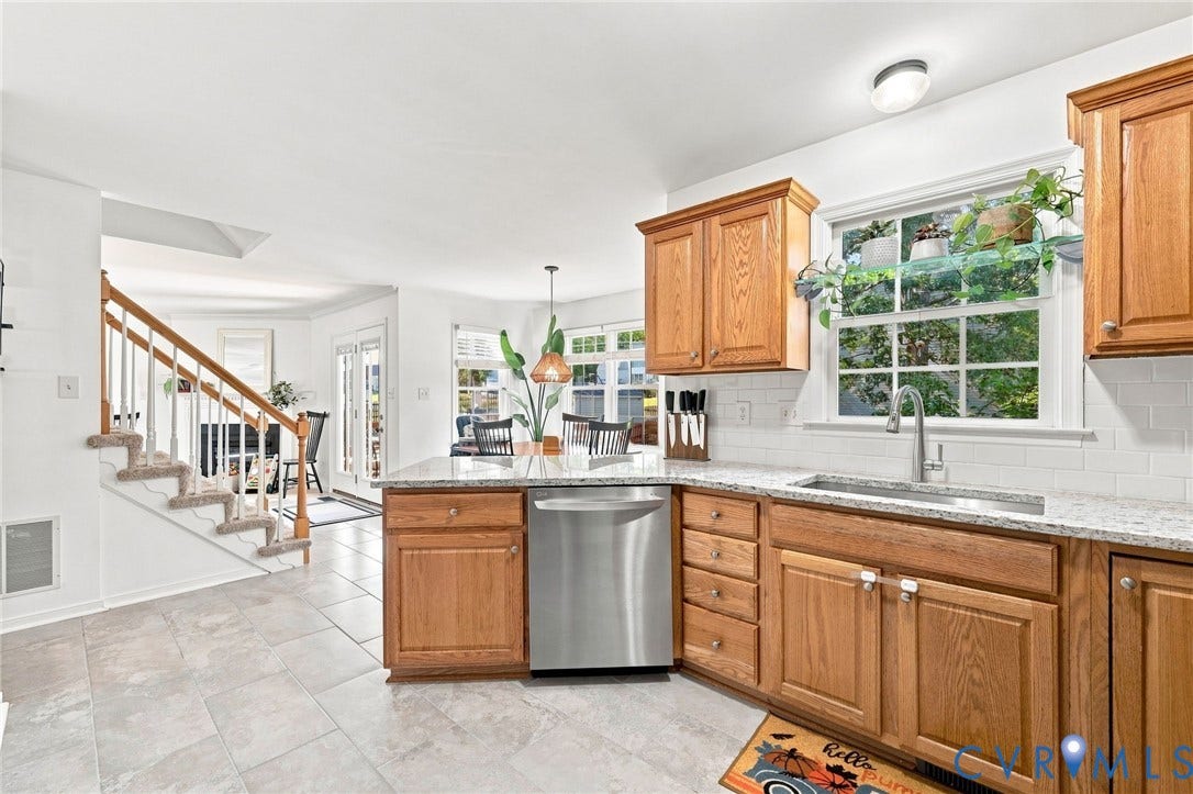 11342 McCauliff Court, North Chesterfield, VA 23236 Kitchen featuring wood cabinetry, stainless steel dishwasher, undermount sink, and light-toned countertops