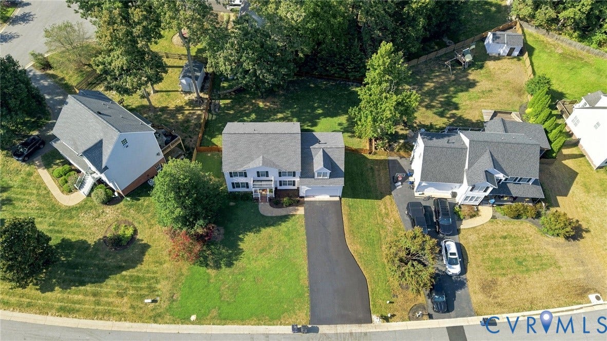 11342 McCauliff Court, North Chesterfield, VA 23236 Two-story colonial-style residence with a dark asphalt shingle roof