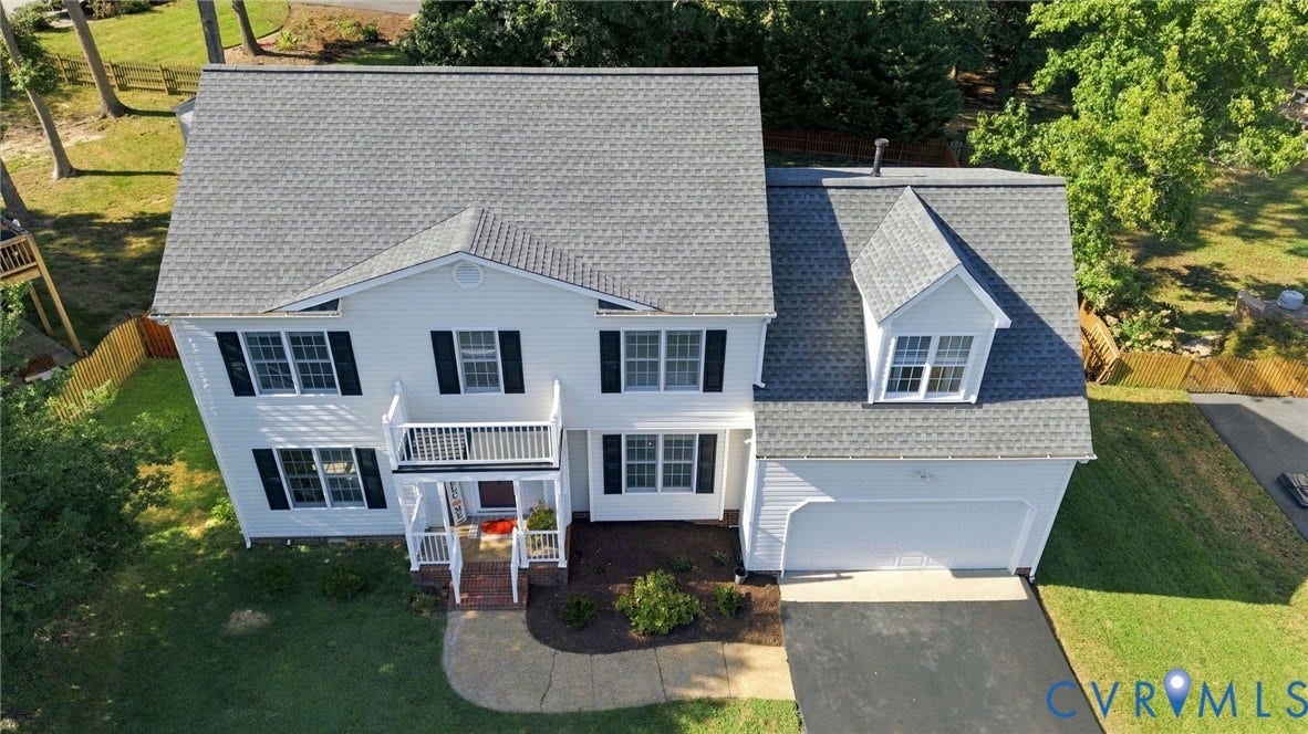 11342 McCauliff Court, North Chesterfield, VA 23236 Two-story residence featuring white siding, dark shutters, and a gray shingle roof