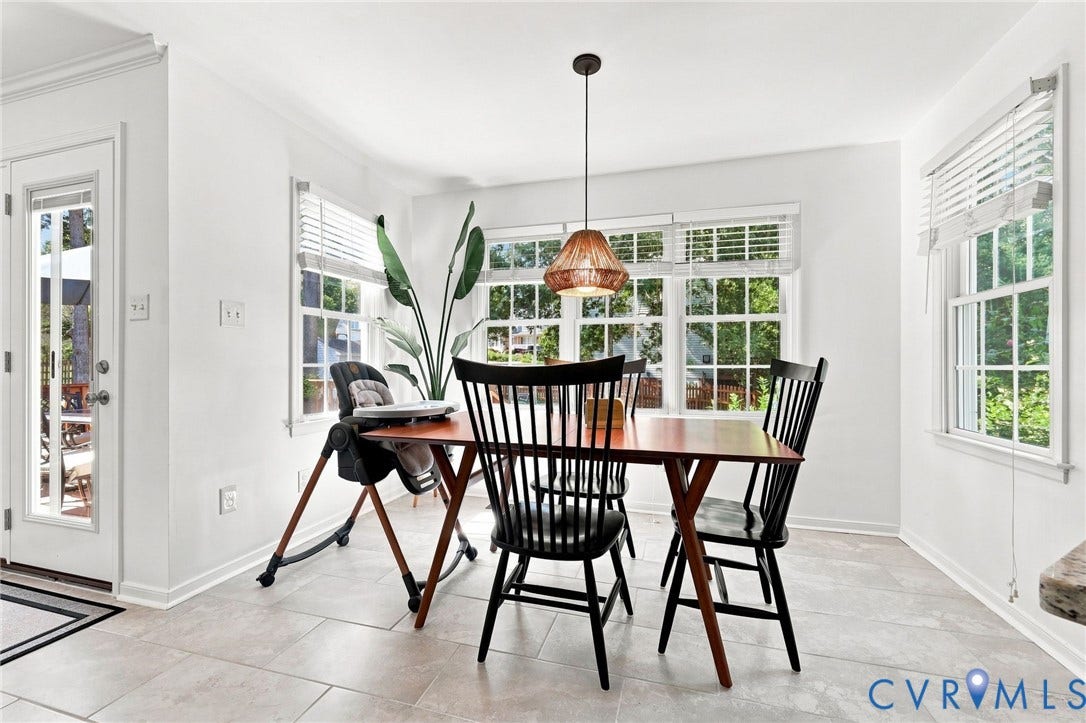 11342 McCauliff Court, North Chesterfield, VA 23236 Recessed lighting, tiled flooring, multiple windows, built-in crown molding, and a modern pendant light fixture