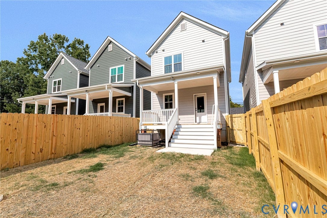 310 E 33rd Street, Swansboro West, Richmond, VA 23224 Private backyard with wood fencing, a covered porch, and exterior stairs