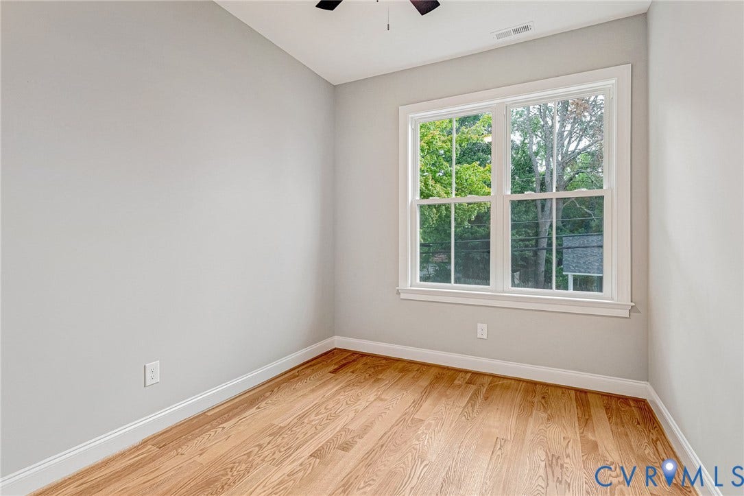 308 E 33rd Street, Swansboro West, Richmond, VA 23224 Hardwood flooring, painted walls, white trim, and a ceiling fan