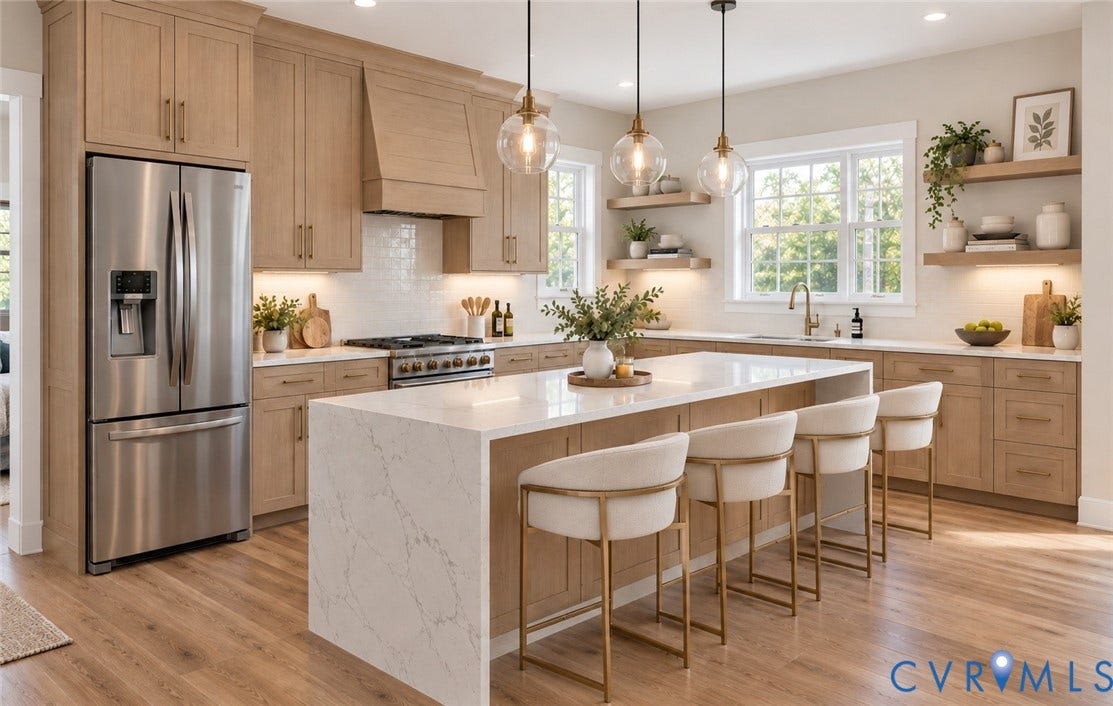 2695 High Bank Place, Powhatan, VA 23139 Well-appointed kitchen featuring light wood-finish cabinetry, stainless steel appliances, a large center island with a waterfall countertop, and pendant lighting