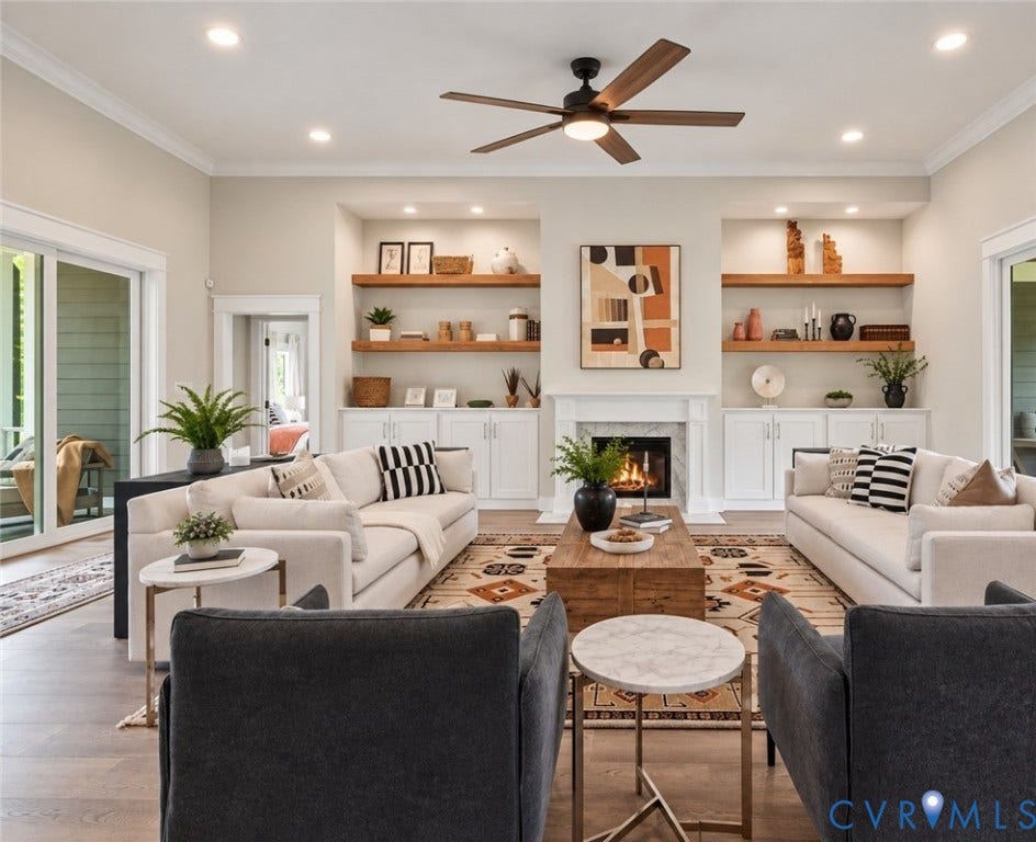2695 High Bank Place, Powhatan, VA 23139 Spacious living area featuring wood-finish flooring, a ceiling fan, recessed lighting, and a fireplace with a white mantel