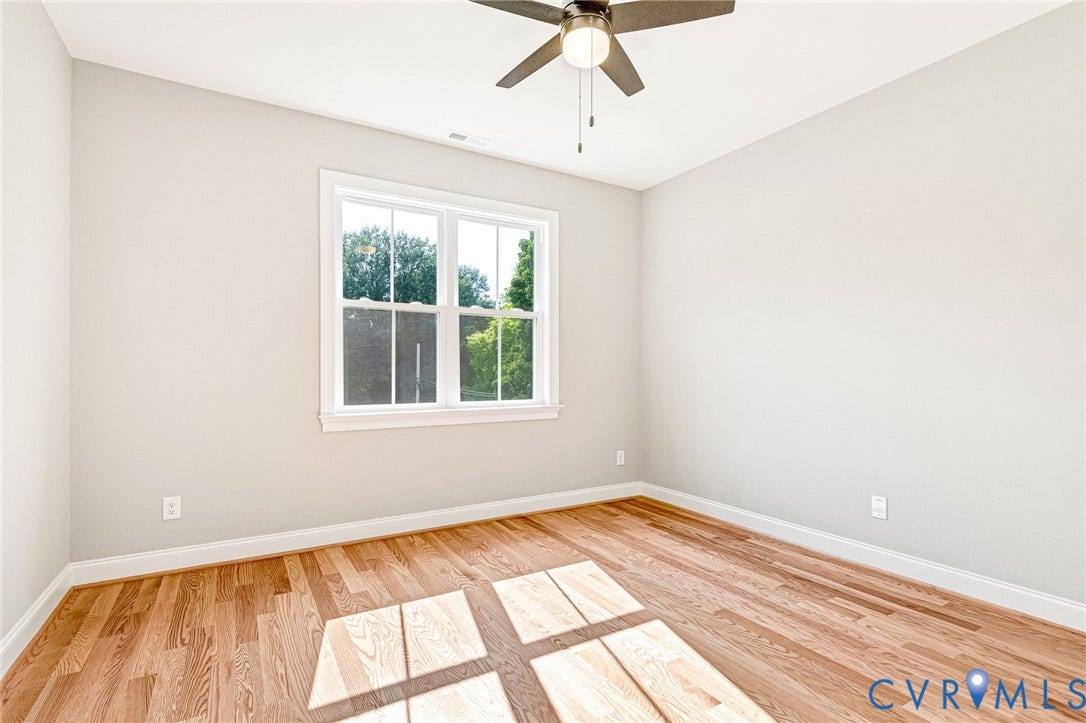 306 E 33rd Street, Swansboro West, Richmond, VA 23224 Hardwood-finish flooring, white trim, ceiling fan, and a double-hung window