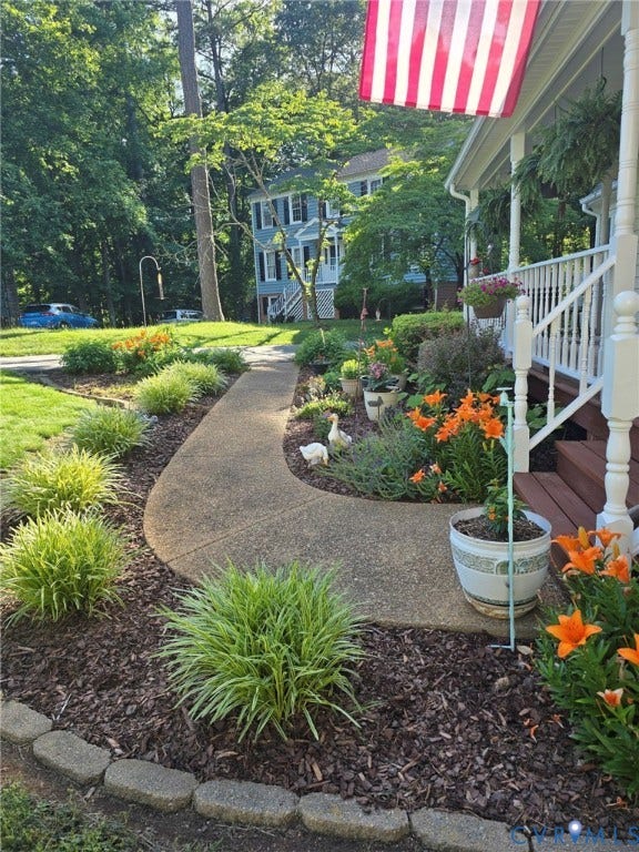 10904 Krossridge Circle, Brandon, North Chesterfield, VA 23236 Front walk in the Spring-lots of beautiful perennials