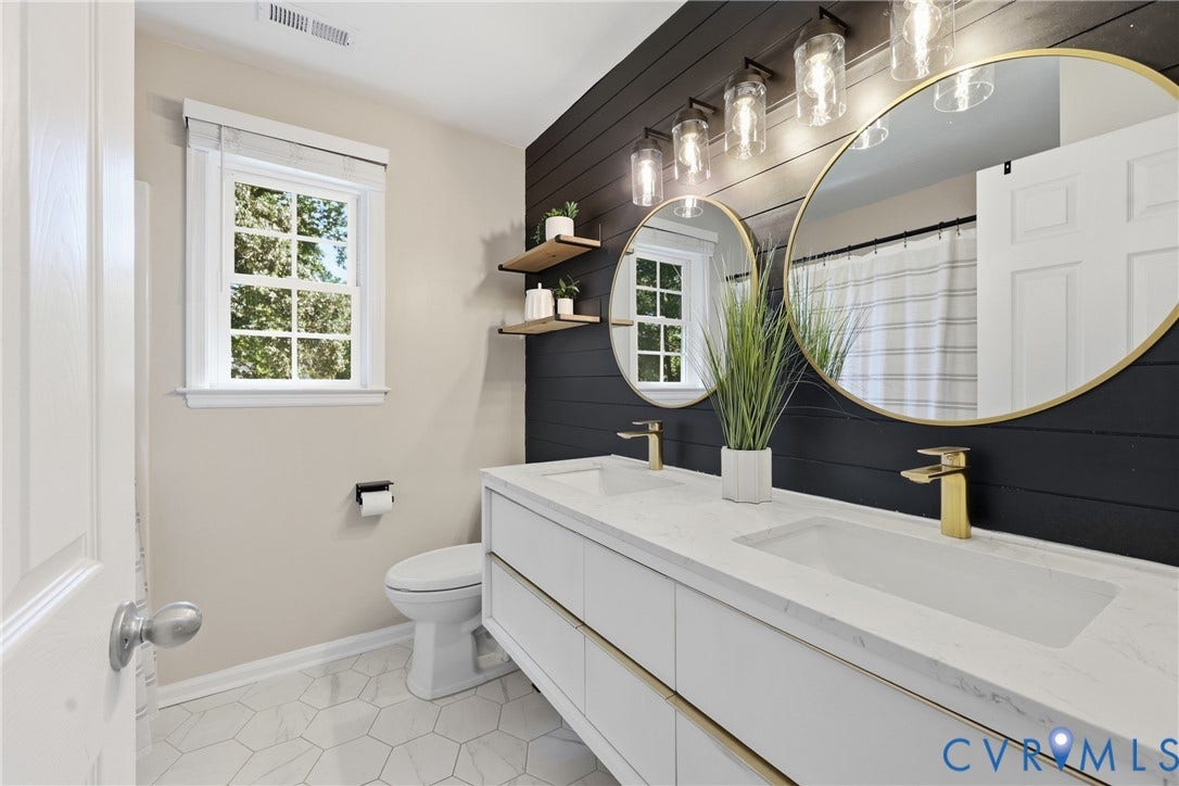 9349 Shiloh Drive, Chesterfield, VA 23237 Dual vanity with white cabinetry and integrated sinks