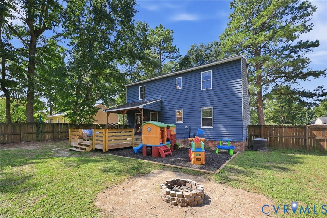 9349 Shiloh Drive, Chesterfield, VA 23237 Blue siding exterior with white window trim