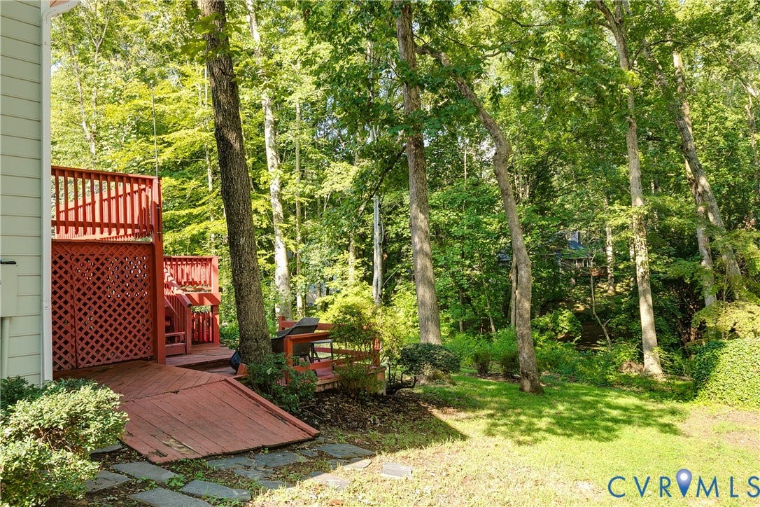 1506 Porters Mill Terrace, Smoketree South, Midlothian, VA 23114 Multi-level red-stained deck with lattice accents