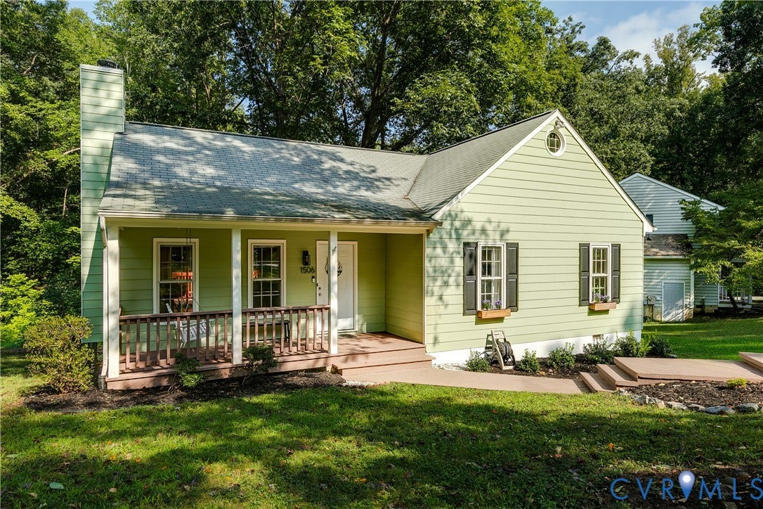1506 Porters Mill Terrace, Smoketree South, Midlothian, VA 23114 Gabled roofline residence featuring light green siding, a covered front porch, and a side chimney