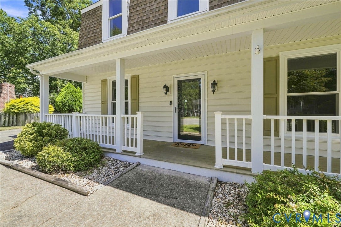4509 Vienna Woods Place, Innsbrook, Henrico, VA 23060 Covered front porch with white railing, light-colored siding, and functional shutters