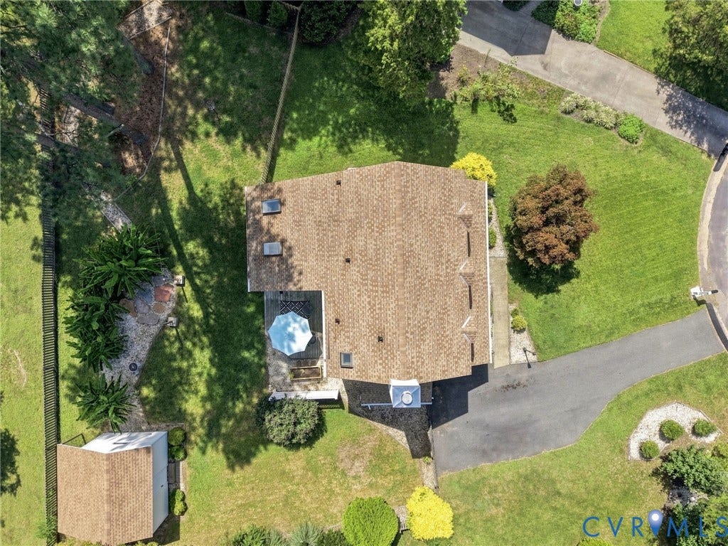 4509 Vienna Woods Place, Innsbrook, Henrico, VA 23060 Pitched shingle roof, paved driveway, rear patio, detached shed, and extensive green space