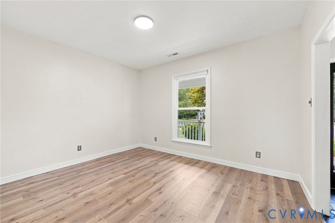 4509 Vienna Woods Place, Innsbrook, Henrico, VA 23060 Recessed lighting, wood-finish flooring, white walls, and a window with outdoor scenery