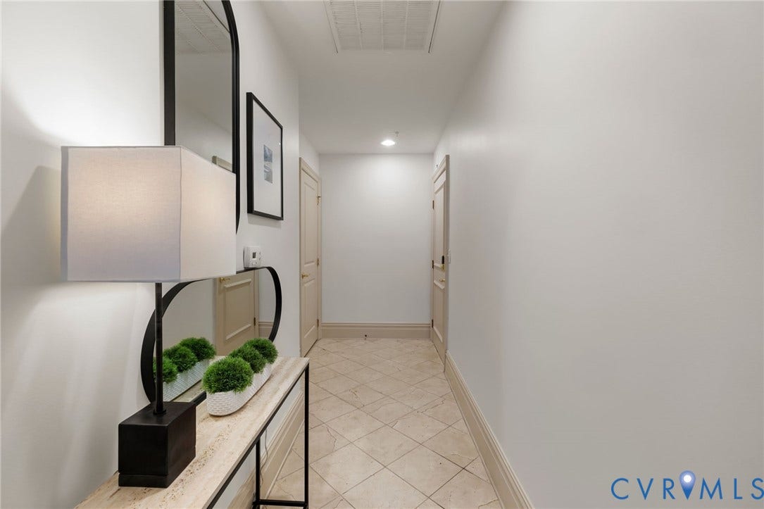 6 N 6th Street, #U5B, Downtown/Financial District, Richmond, VA 23219 Hallway with light-toned walls, tile flooring, and recessed lighting