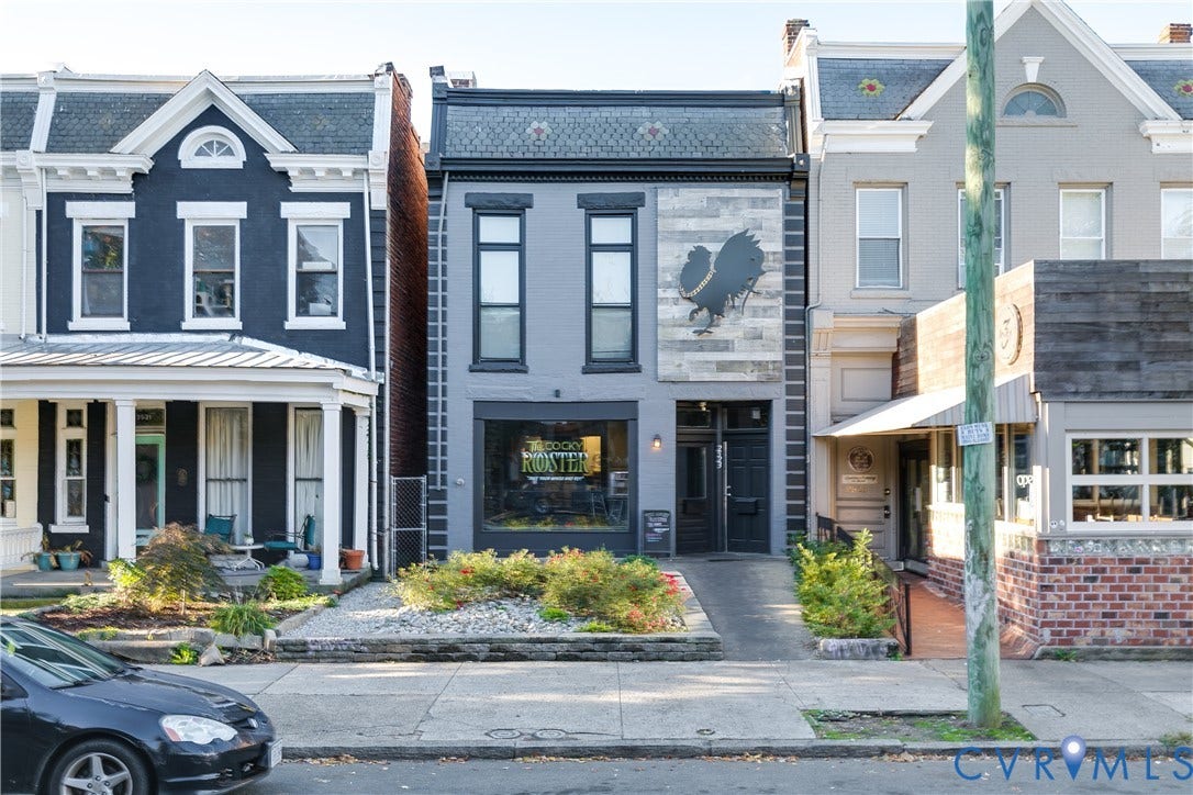2523 W Main Street, The Fan, Richmond, VA 23220 Commercial storefront with a large display window and a prominent sign
