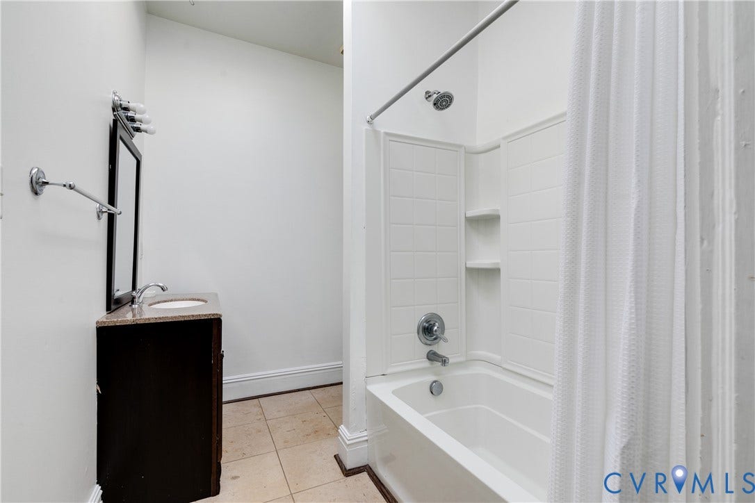 2523 W Main Street, The Fan, Richmond, VA 23220 Bathroom featuring a shower/tub combination, vanity with countertop, and tile flooring
