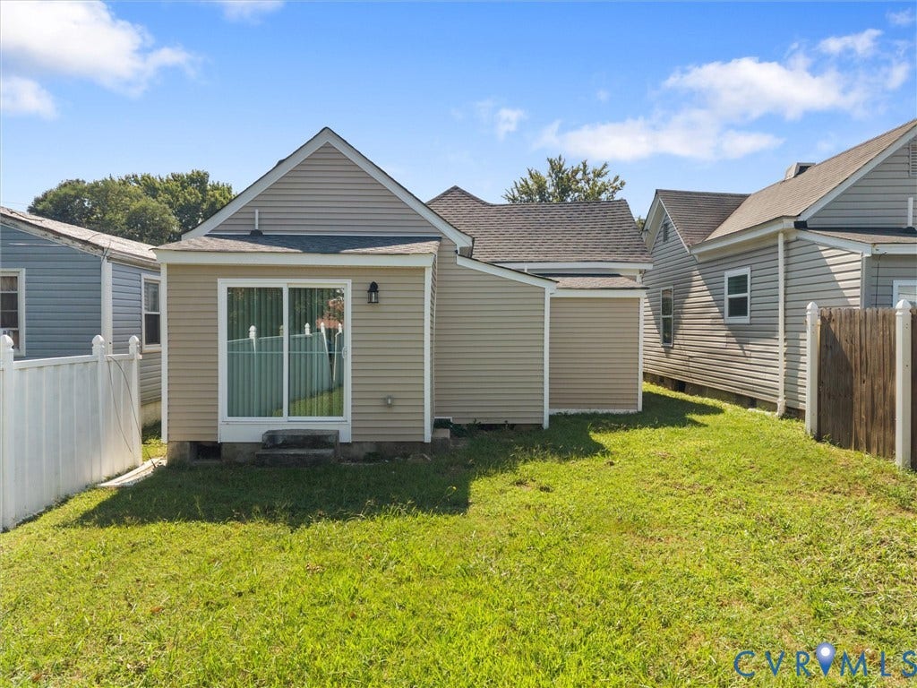 3059 Decatur Street, Richmond, VA 23224 Back yard with sliding glass door from the laundry room
