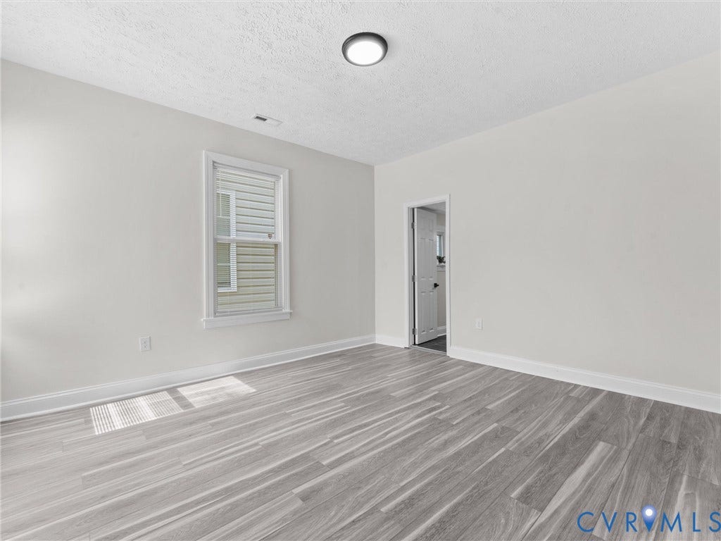 3059 Decatur Street, Richmond, VA 23224 Primary bedroom with full ensuite batrhoom